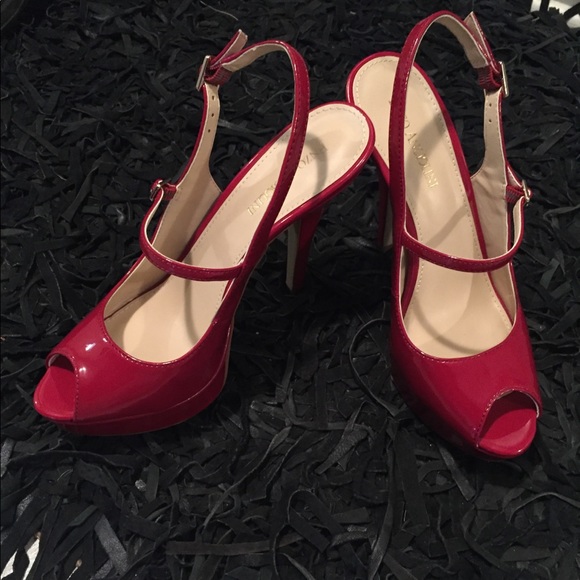 Enzo Angiolini Shoes - Enzo Angiolini red peep toe heels.